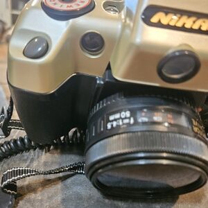 Nikon Black and Gold Digital Camera